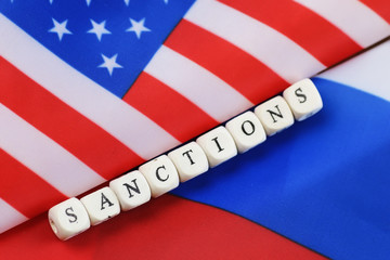 russian and usa flag sanctions