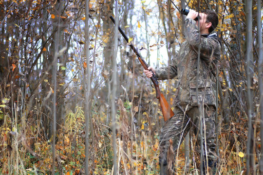man hunter outdoor in autumn hunting
