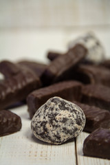 Chocolate bars on wooden background