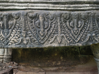 Ancient style pattern on sand stone carving at Phimai historical