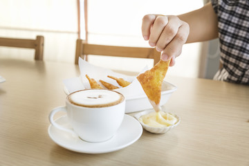 Crispy mozzarella wonton with coffee