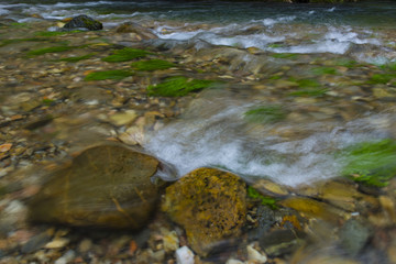 rive in the mountain with water flowing