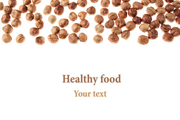Hazelnut border on white background. Pile of selected hazel close-up. Isolated. For vegetarians.