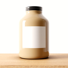 Closeup of one blank brown color glass jar on the wood desk and white wall background.Empty glassy container , gray mockup label in center.Drinks,food storage concept.3d rendering.