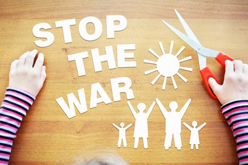 Little girl protests against the war. Concept with paper scrapbooking