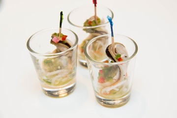  mussels cocktail  with sauce in a glass