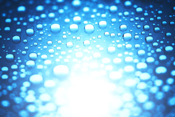 Blue water drops of on treat water-repellent surface in macro lens shot small-DOF for screen...
