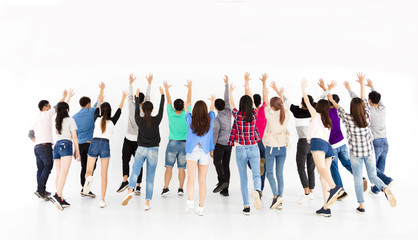 Fototapeta premium rear view of young group run forwarding and catching