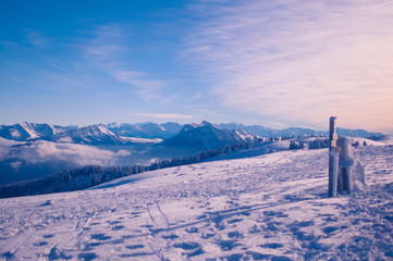 Sunset on a snowy mountain