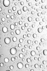 bw photo water drops of on treat water-repellent surface in macro lens shot small-DOF for screen...