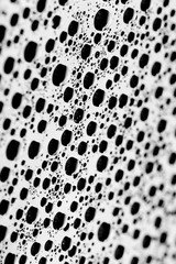 bw photo water drops of on treat water-repellent surface in macro lens shot small-DOF for screen...