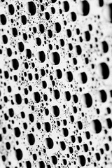 bw photo water drops of on treat water-repellent surface in macro lens shot small-DOF for screen...