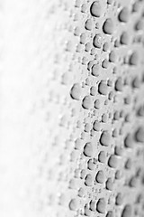 bw photo water drops of on treat water-repellent surface in macro lens shot small-DOF for screen...