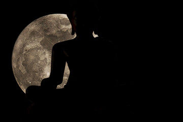 Silhouettes of buddha statue and super moon, Full moon