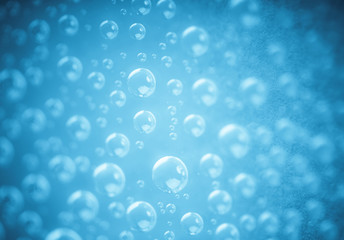 Blue water drops of on treat water-repellent surface in macro lens shot small-DOF for screen wallpapers