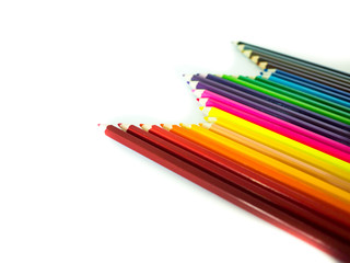 Colorful pencils on white background