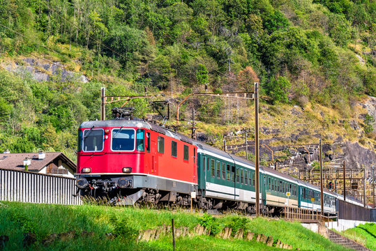 Passenger train is climbing up the Gotthard pass - Switzerland