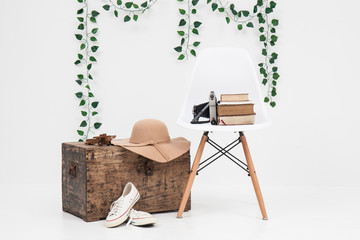 suitcase with shoes, and flower ready for travel