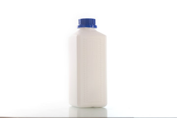 Four blank plastic containers for medicine on white background