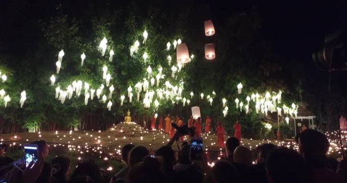 Monks casting lanterns for Loi krathong Yi Peng festival