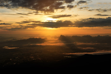 The landscape photo, beautiful sea fog in morning time at Sunrise Viewpoint, Phu Kradueng National Park in Thailand