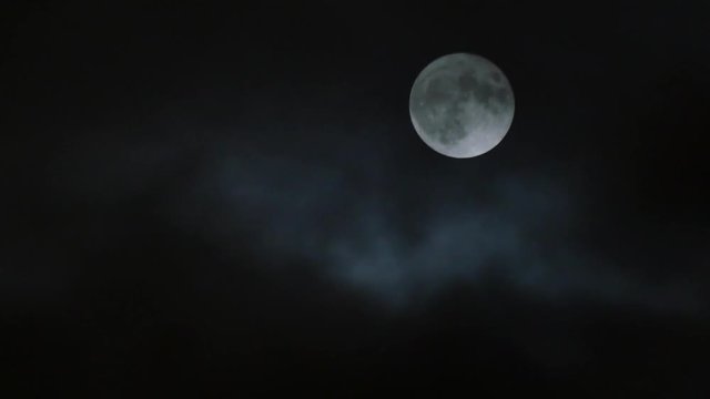 super moon with clouds