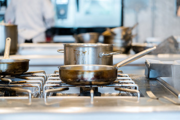 Kitchen luxury cooking closeup pot on the gas stove

