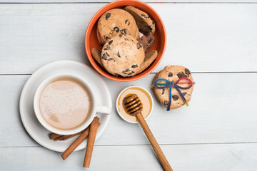 Coffee with cookies and honey