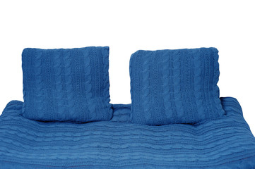 sofa and two pillows in blue isolated on white background
