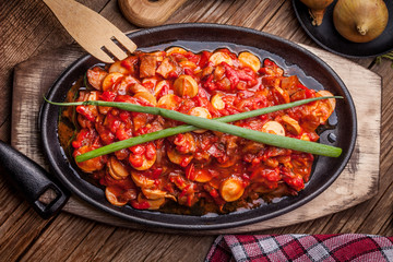 Lecho - stew with peppers, onions and sausages.