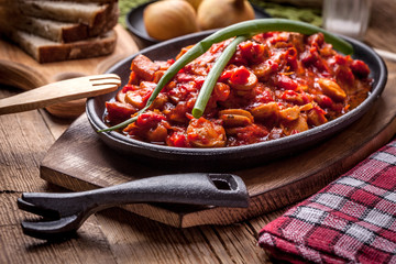 Lecho - stew with peppers, onions and sausages.