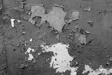 Wall fragment with scratches and cracks