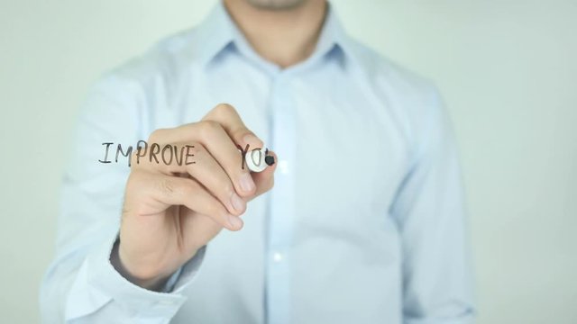 Improve Your Skills, Man Writing on Screen