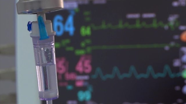 Medical drip in the background respirator operating
