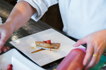 Chef  prepare foie gras dish
