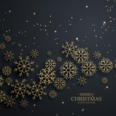 Fototapeta na wymiar awesome black background with gold snowflakes for merry christma