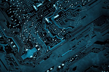 Close up of a printed blue computer circuit board