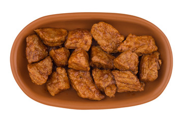 Stew in a brown plate. (Goulash) isolated on white background.