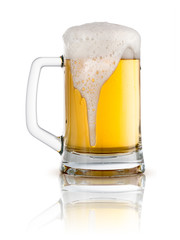 Fresh beer in a glass isolated on a white background