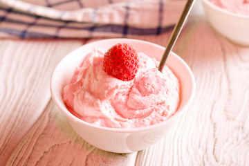 Delicious bowl of strawberry ice cream