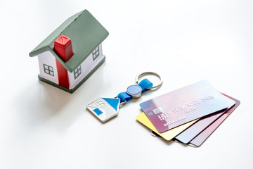 credit card concept mortgag for new home on white background