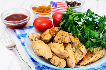 Roasted turkey breast with seasonal vegetables and parsley on th