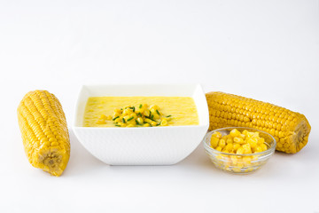 Corn soup in white bowl isolated on white background
