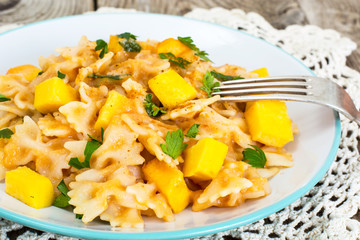 Farfalle with pumpkin and carrot sauce