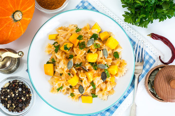 Farfalle with pumpkin and carrot sauce
