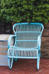 Fototapeta na wymiar Design vintage furniture of the restaurant outdoor. Blue wicker