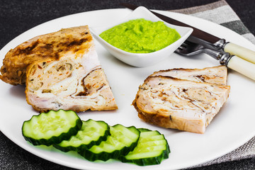 Stuffed chicken with omelette, meat and mushrooms