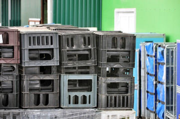 Store unloading. Plastic containers for storage and transportation of products.