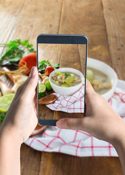 Taking Photo Of Chicken And Coconut Milk Soup 