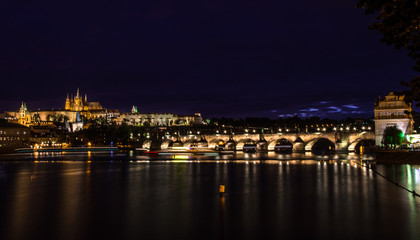 Fototapeta na wymiar Night view on Charles Bridge in the Prague 